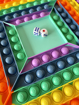 Obrázek z Pop It Rainbow MEGA JUMBO s kostkami - antistresová hračka čtverec 